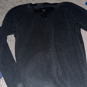 A Bundle of Long Sleeved Shirts